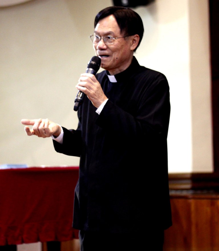 13a- photo1-Rev. Fr. Lau giving a talk to the audience