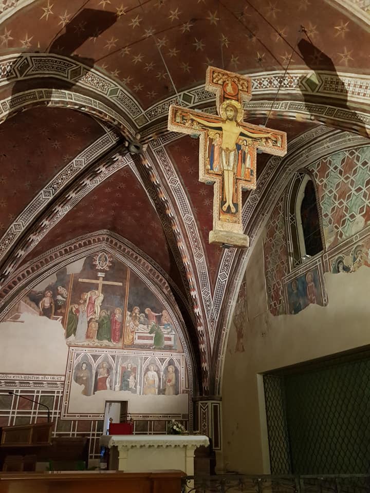 Standing “un-haloed” at the foot of the Cross with our eyes fixed on Jesus