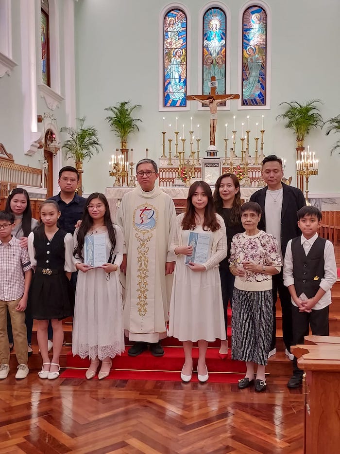 First Communion of Edna Ritchie and Roxanne Pangan