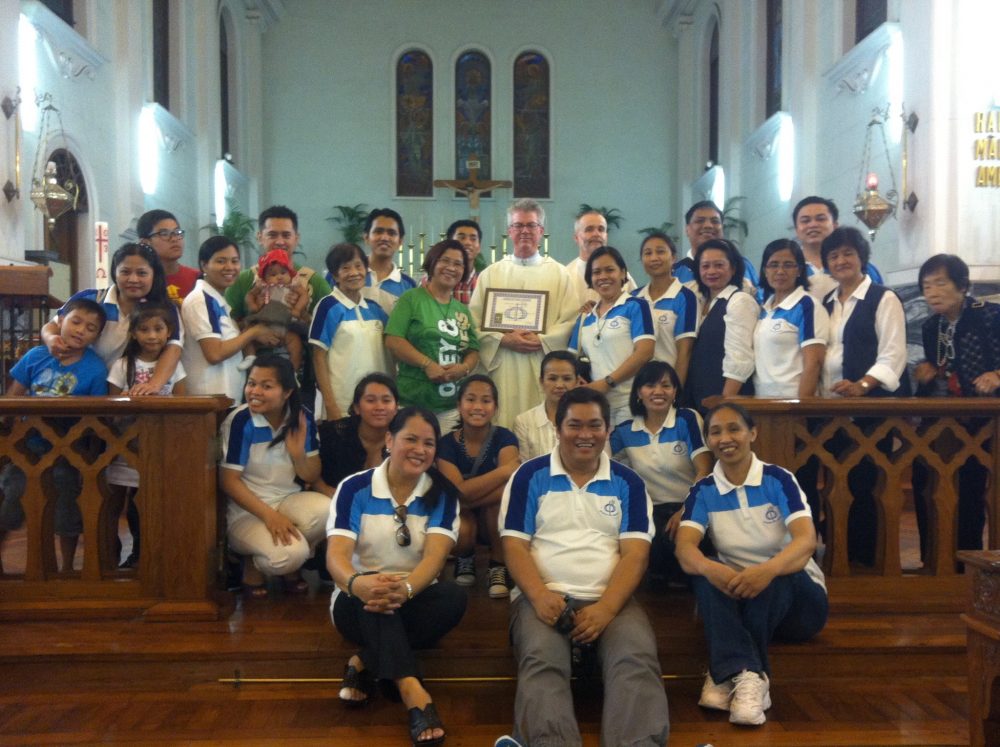 Group picture of the CFC Macau Choir with Rev Fr James Liebner/ Rev Fr Francis Gassner